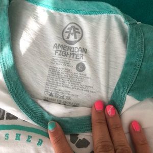 White and teal American fighter shirt